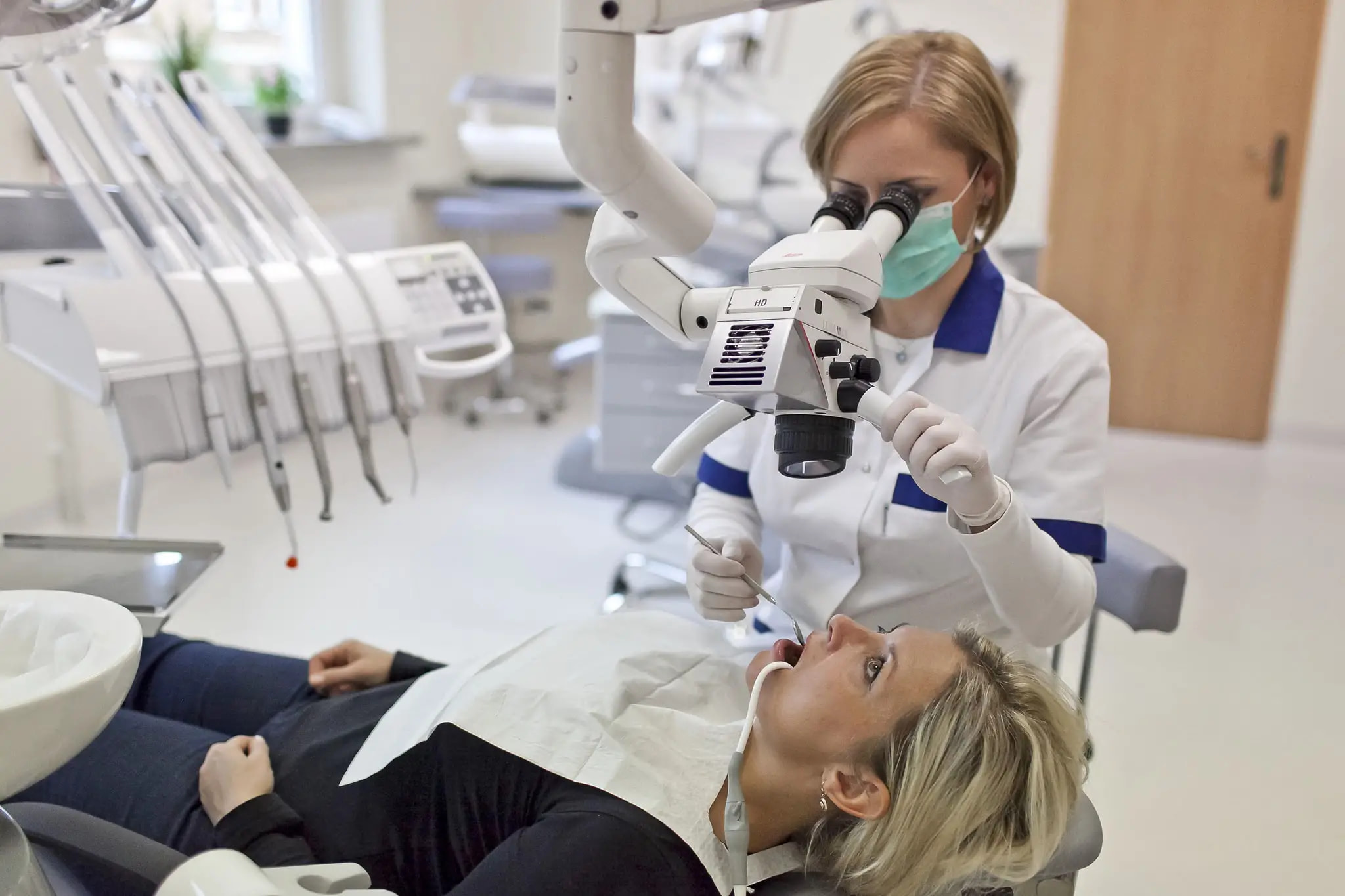 specialist carrying out root canal treatment